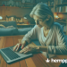 an older woman using a laptop